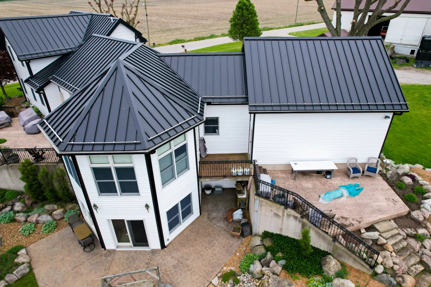 Tarping and dry-in on a Chatham Hills commercial roof